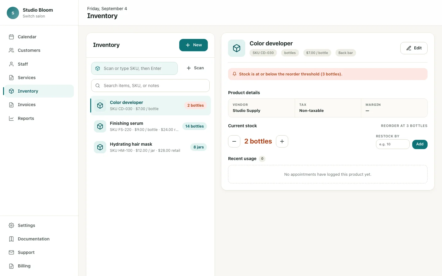 Chairbase inventory with retail products and a low-stock alert